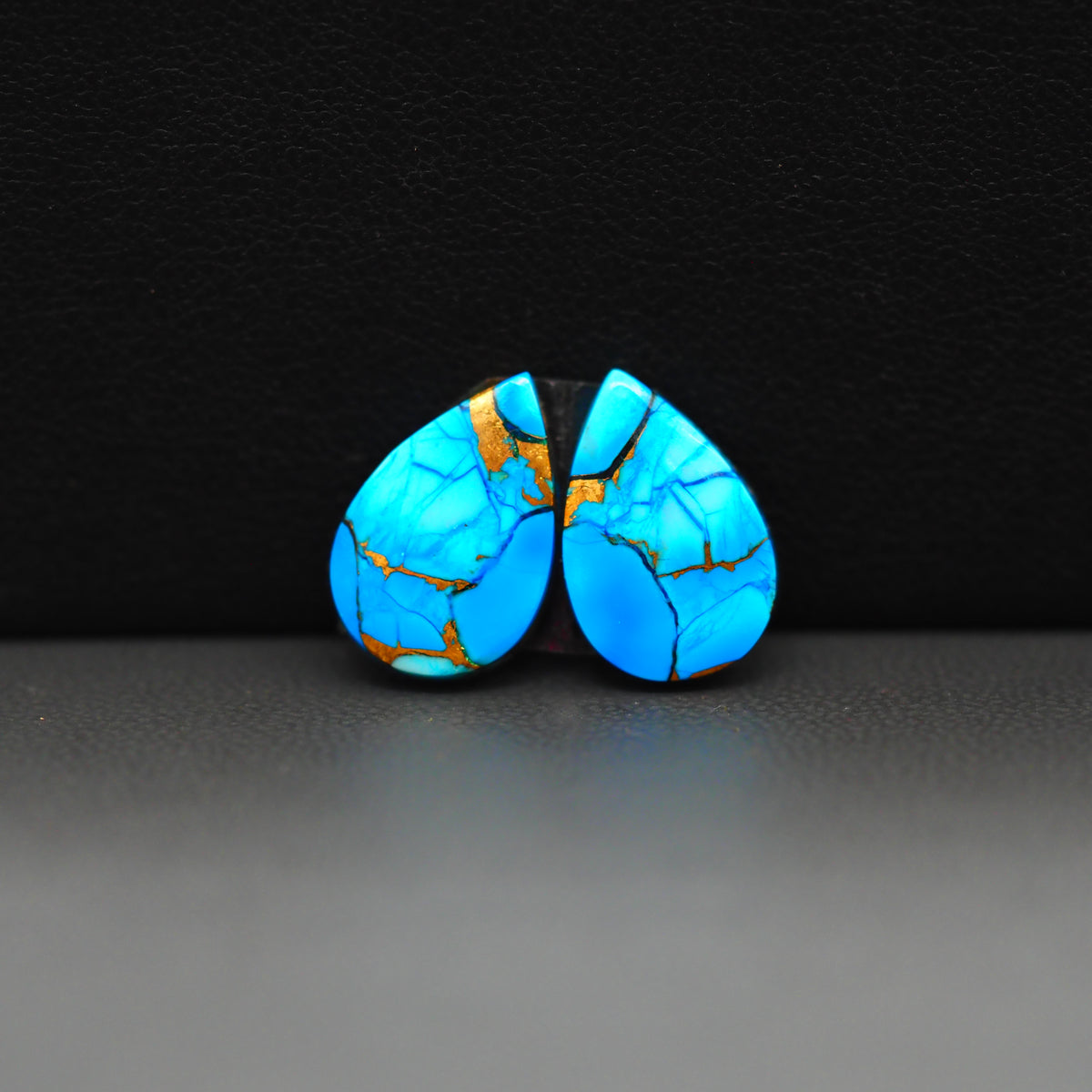 Kingman Ice Blue Dahlia Composite Pear Cabochon Pair 14x10x3mm 8.5ct - icy blue and white stone with copper veining - Pedra Gems