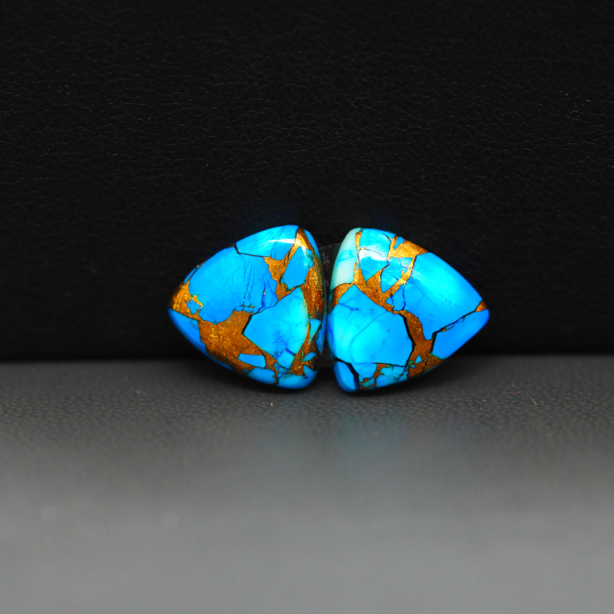 Kingman Ice Blue Dahlia Composite Trillion Cabochon Pair 13x13x3mm 10ct - icy blue and white stone with copper veining - Pedra Gems