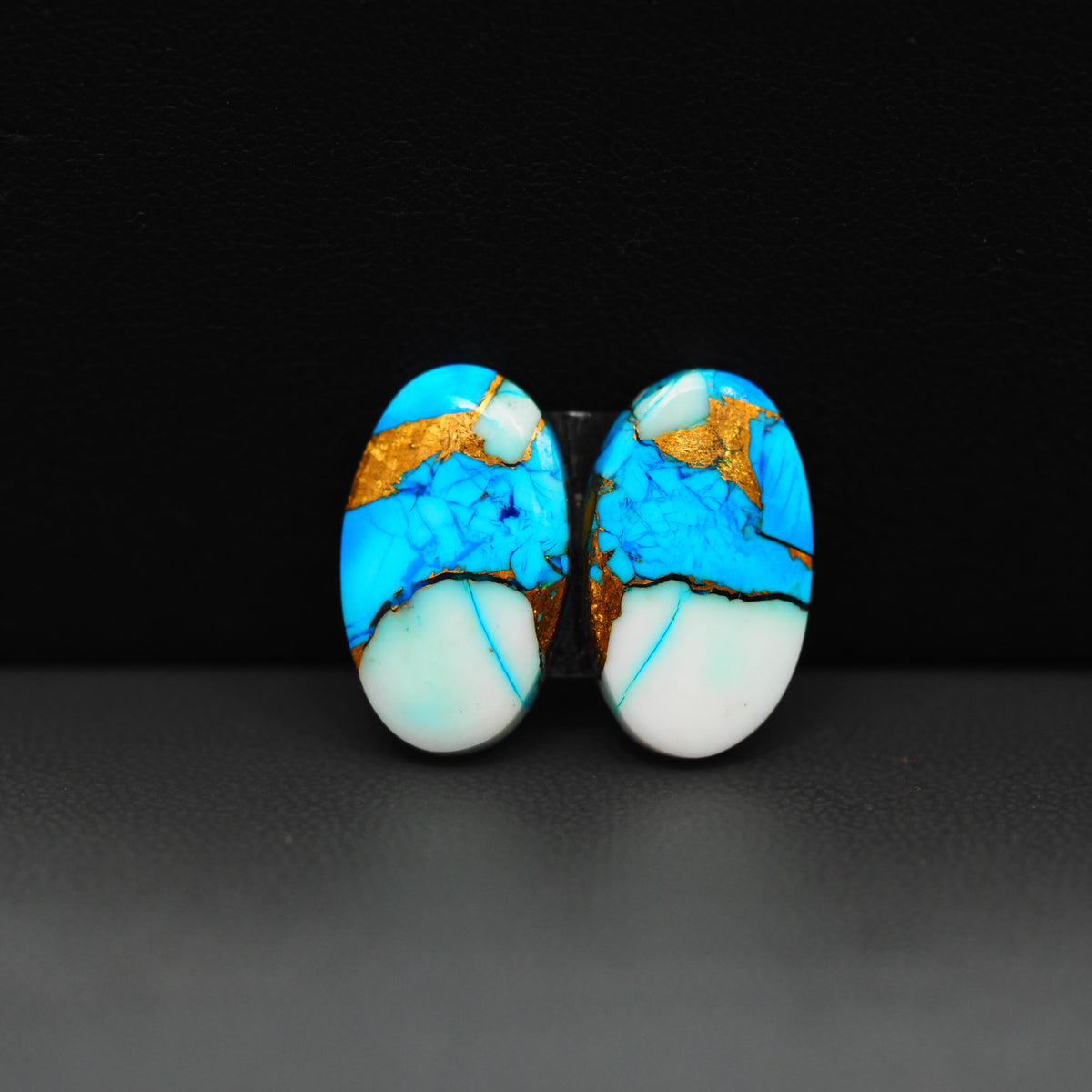 Kingman Ice Blue Dahlia Composite Oval Cabochon Pair 18x11x3mm 12.5ct - icy blue and white stone with copper veining - Pedra Gems