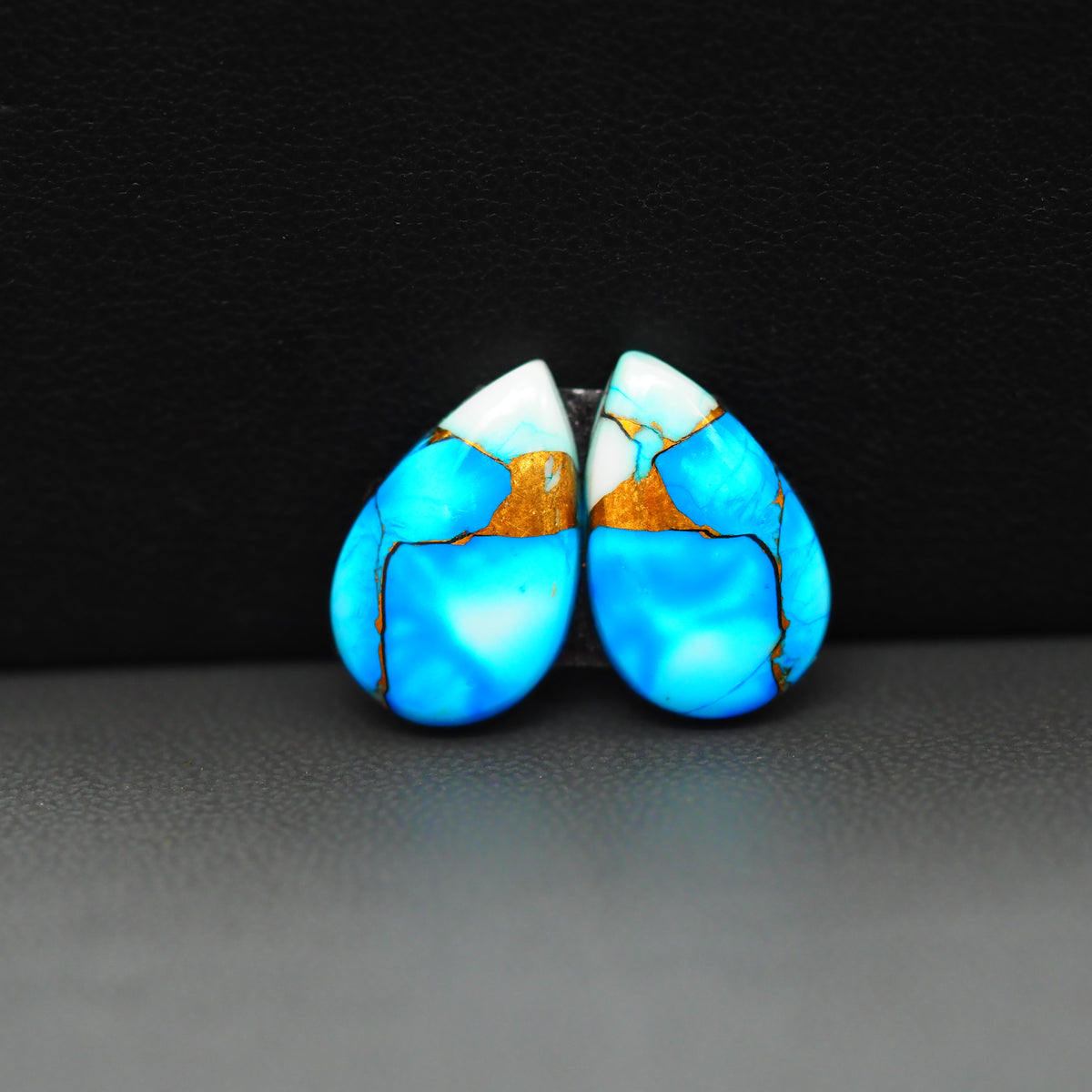 Kingman Ice Blue Dahlia Composite Pear Cabochon Pair 17x11x3mm 10.5ct - icy blue and white stone with copper veining - Pedra Gems