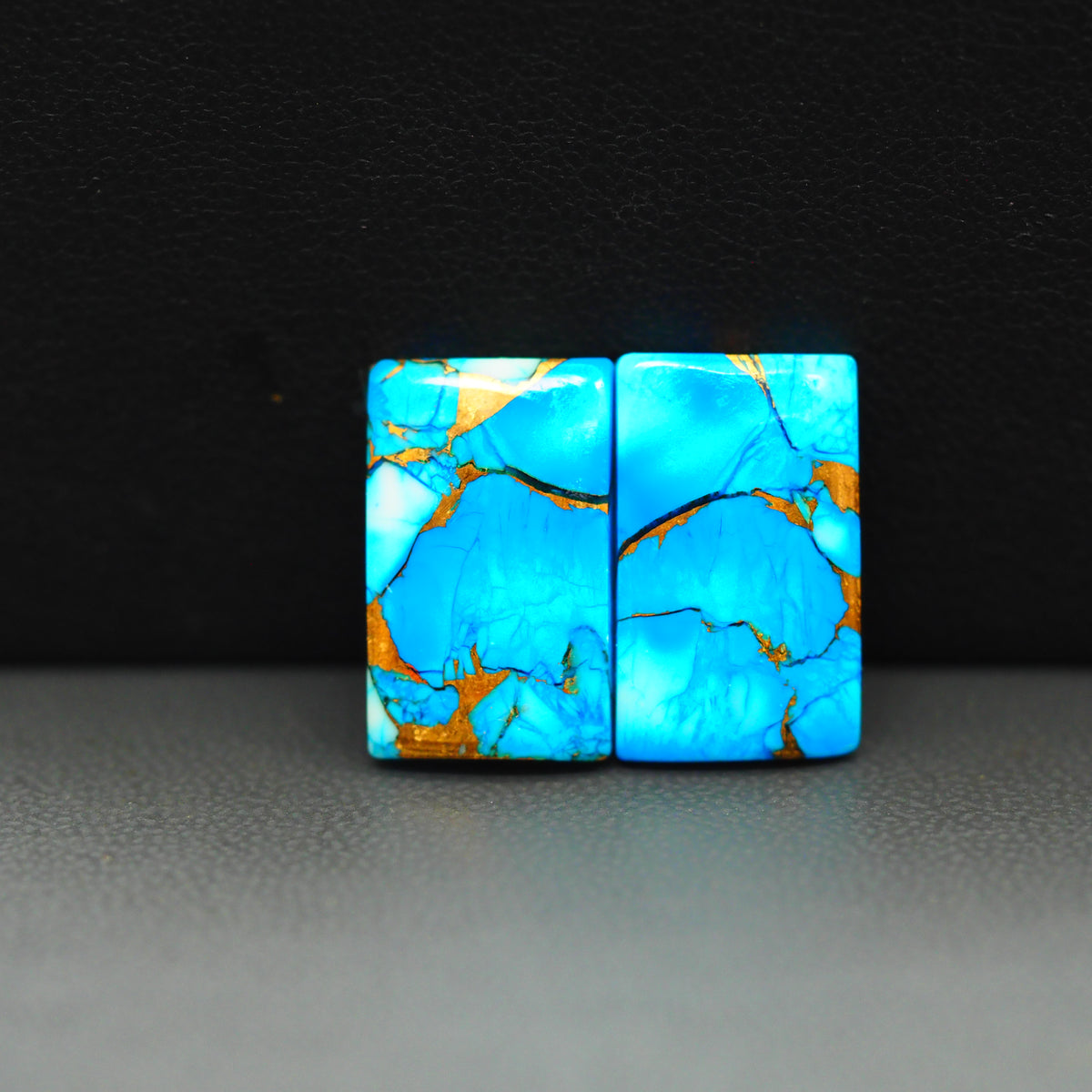 Kingman Ice Blue Dahlia Composite Rectangle Cabochon Pair 17x11x3mm 15ct - icy blue and white stone with copper veining - Pedra Gems