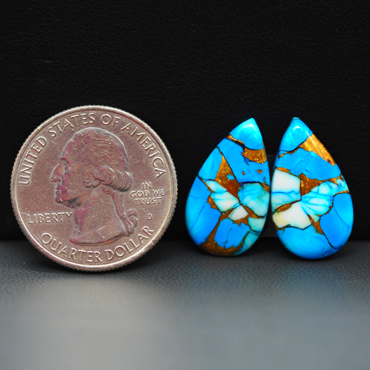Kingman Ice Blue Dahlia Composite Pear Cabochon Pair 20x11x3mm 14.5ct - icy blue and white stone with copper veining - Pedra Gems