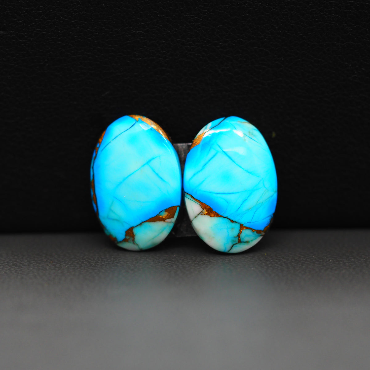 Kingman Ice Blue Dahlia Composite Oval Cabochon Pair 17x12x3mm 12.5ct - icy blue and white stone with copper veining - Pedra Gems