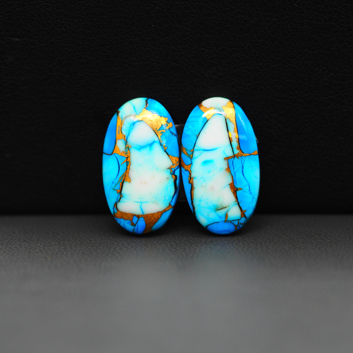 Kingman Ice Blue Dahlia Composite Oval Cabochon Pair 20x12x3mm 15.5ct - icy blue and white stone with copper veining - Pedra Gems