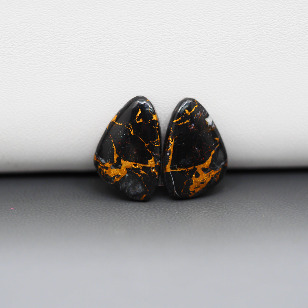 Kingman Black Buffalo Copper Composite Freeform Cabochon Pair 17x11x3mm 10ct - black stone with bright copper veins - Pedra Gems