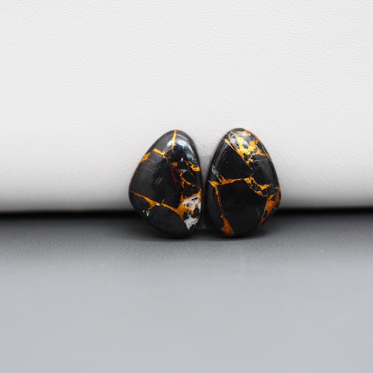 Kingman Black Buffalo Copper Composite Freeform Cabochon Pair 16x11x3mm 10ct - black stone with bright copper veins - Pedra Gems