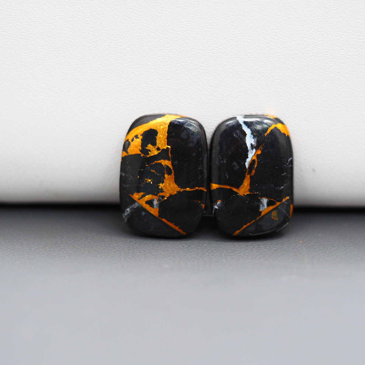 Kingman Black Buffalo Copper Composite Cushion Cabochon Pair 18x13x3mm 14ct - black stone with bright copper veins - Pedra Gems