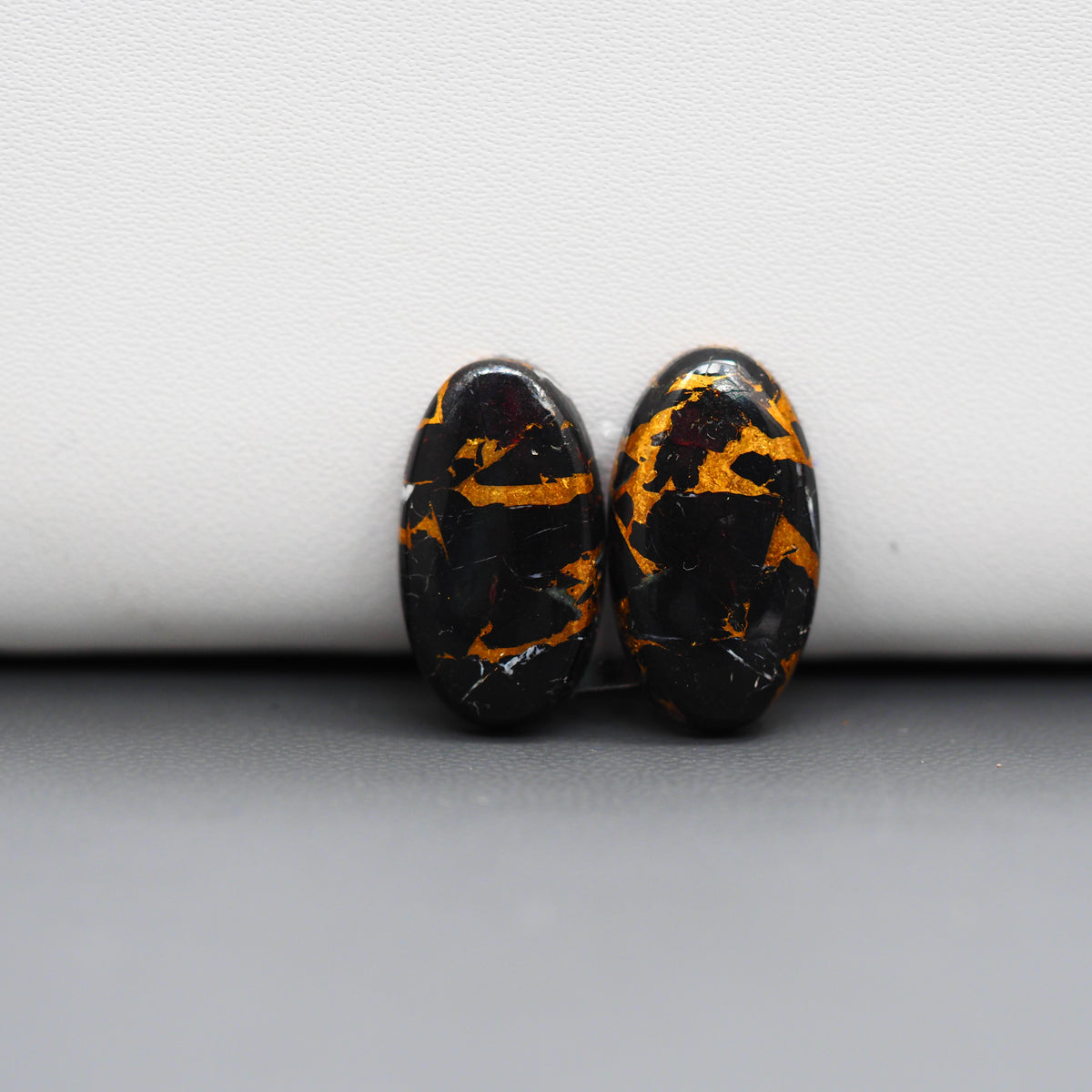 Kingman Black Buffalo Copper Composite Oval Cabochon Pair 19x10x3mm 12.5ct - black stone with bright copper veins - Pedra Gems