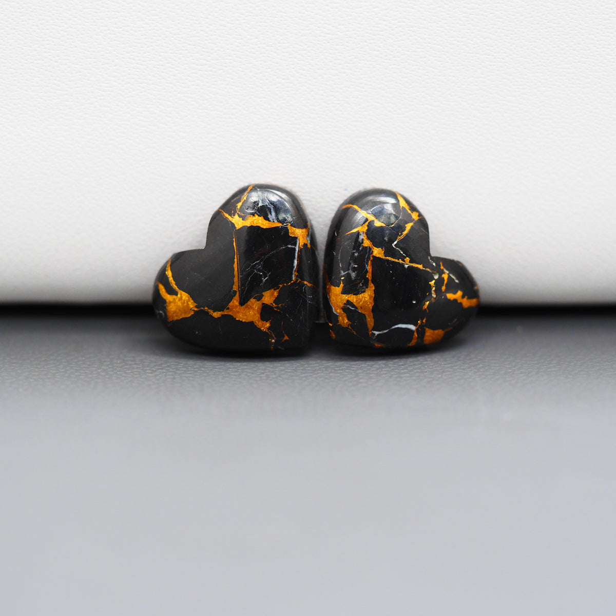 Kingman Black Buffalo Copper Composite Heart Cabochon Pair 13x15x3mm 11.5ct - black stone with bright copper veins - Pedra Gems