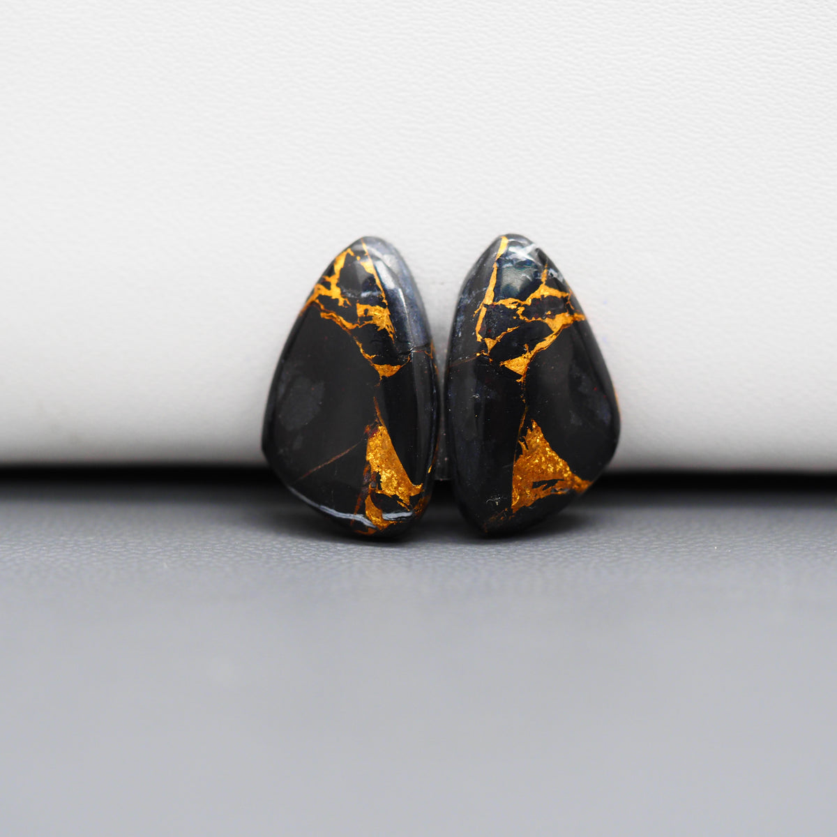 Kingman Black Buffalo Copper Composite Freeform Cabochon Pair 18x11x3mm 11.5ct - black stone with bright copper veins - Pedra Gems