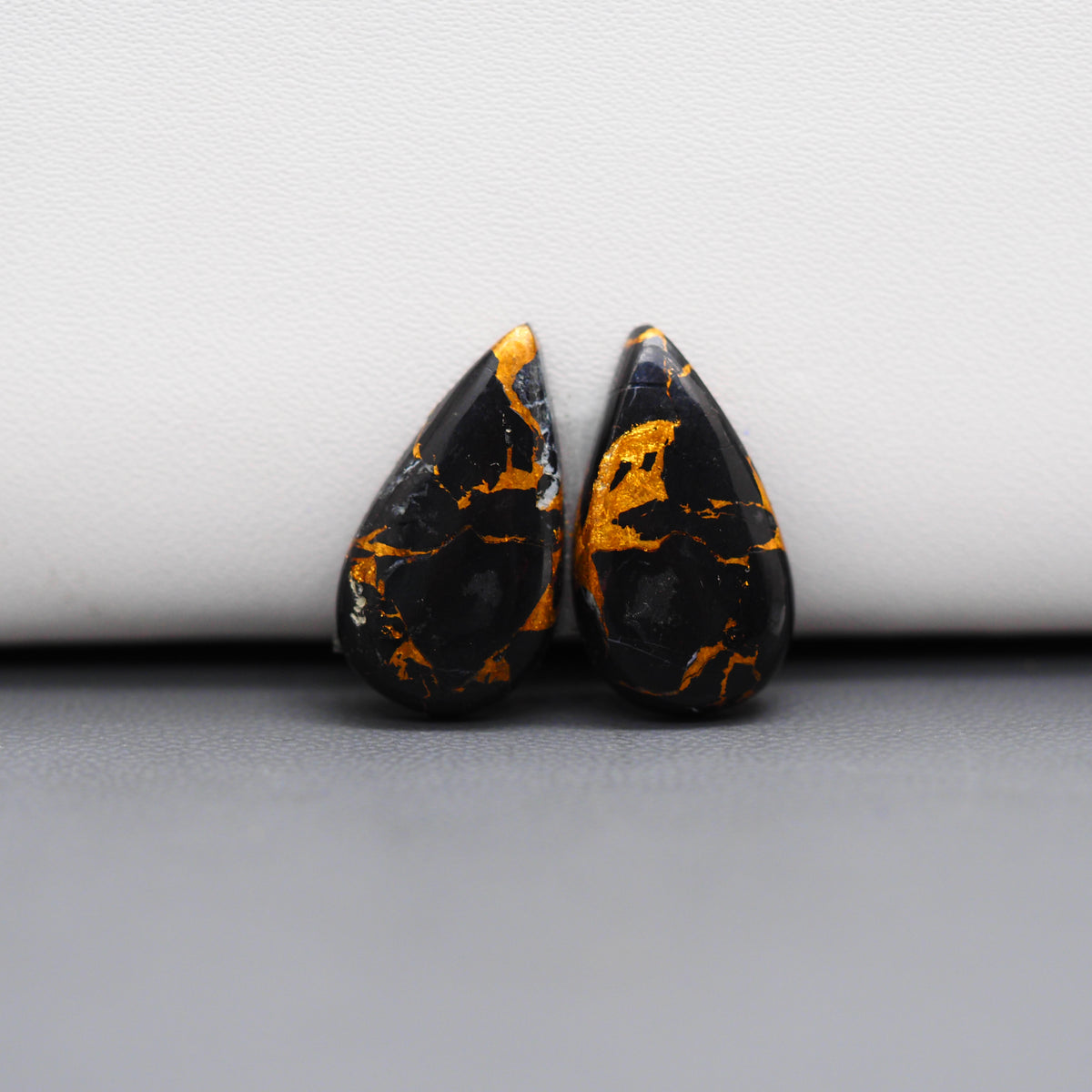 Kingman Black Buffalo Copper Composite Pear Cabochon Pair 20x11x3mm 12ct - black stone with bright copper veins - Pedra Gems