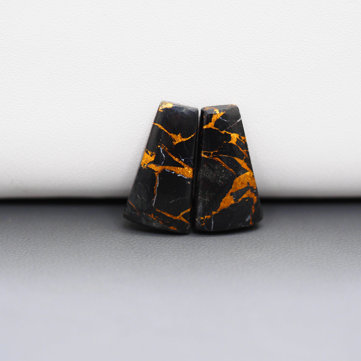 Kingman Black Buffalo Copper Composite Trapezoid Cabochon Pair 19x11x3mm 13.5ct - black stone with bright copper veins - Pedra Gems