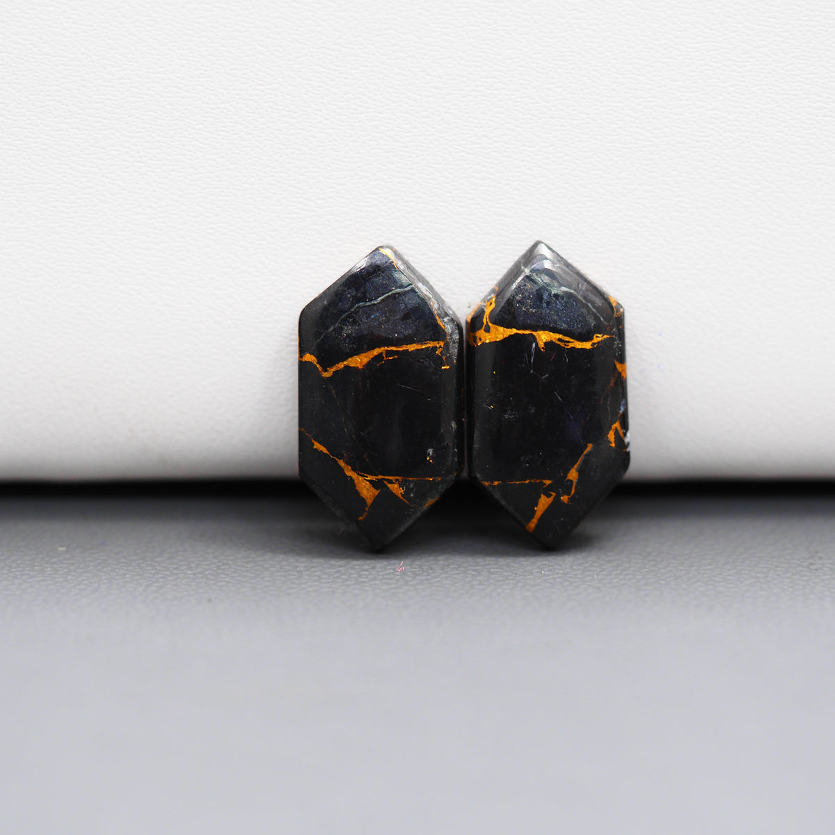 Kingman Black Buffalo Copper Composite Hexagon Cabochon Pair 20x11x3mm 12ct - black stone with bright copper veins - Pedra Gems
