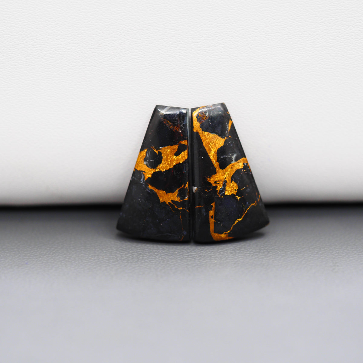 Kingman Black Buffalo Copper Composite Trapezoid Cabochon Pair 21x12x3mm 15ct - black stone with bright copper veins - Pedra Gems