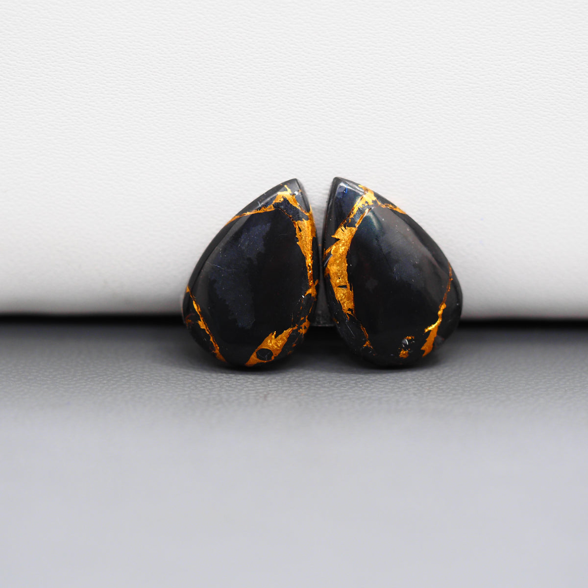Kingman Black Buffalo Copper Composite Pear Cabochon Pair 18x12x3mm 12ct - black stone with bright copper veins - Pedra Gems
