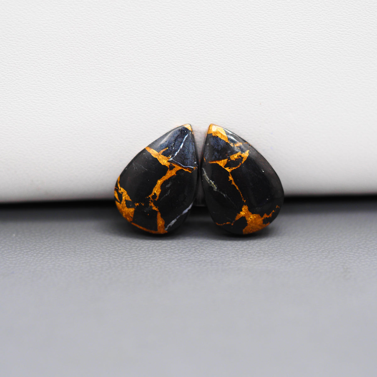 Kingman Black Buffalo Copper Composite Pear Cabochon Pair 17x11x3mm 12ct - black stone with bright copper veins - Pedra Gems
