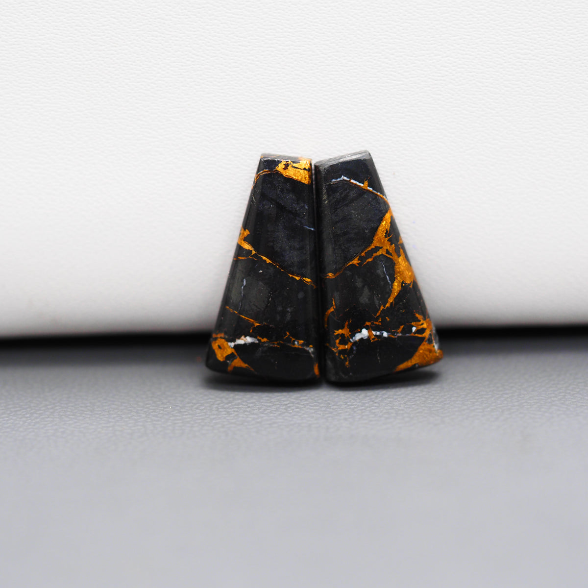 Kingman Black Buffalo Copper Composite Trapezoid Cabochon Pair 21x10x3mm 11.5ct - black stone with bright copper veins - Pedra Gems