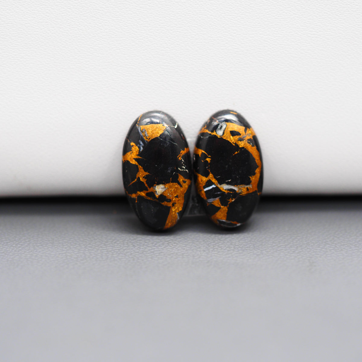 Kingman Black Buffalo Copper Composite Oval Cabochon Pair 18x11x3mm 12ct - black stone with bright copper veins - Pedra Gems