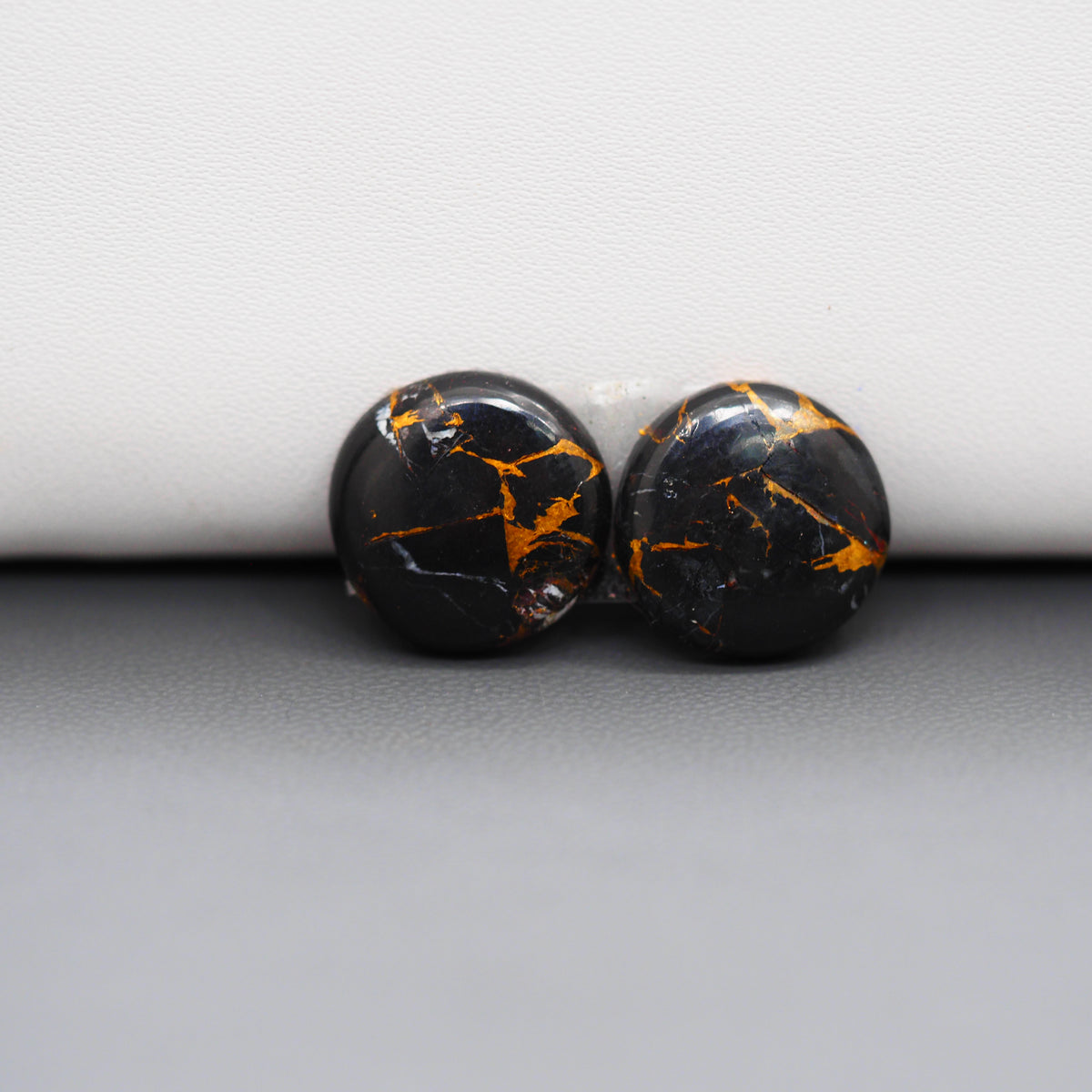 Kingman Black Buffalo Copper Composite Round Cabochon Pair 15x15x4mm 13.5ct - black stone with bright copper veins - Pedra Gems