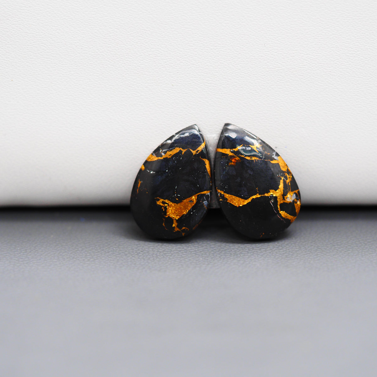 Kingman Black Buffalo Copper Composite Pear Cabochon Pair 20x13x3mm 12.5ct - black stone with bright copper veins - Pedra Gems