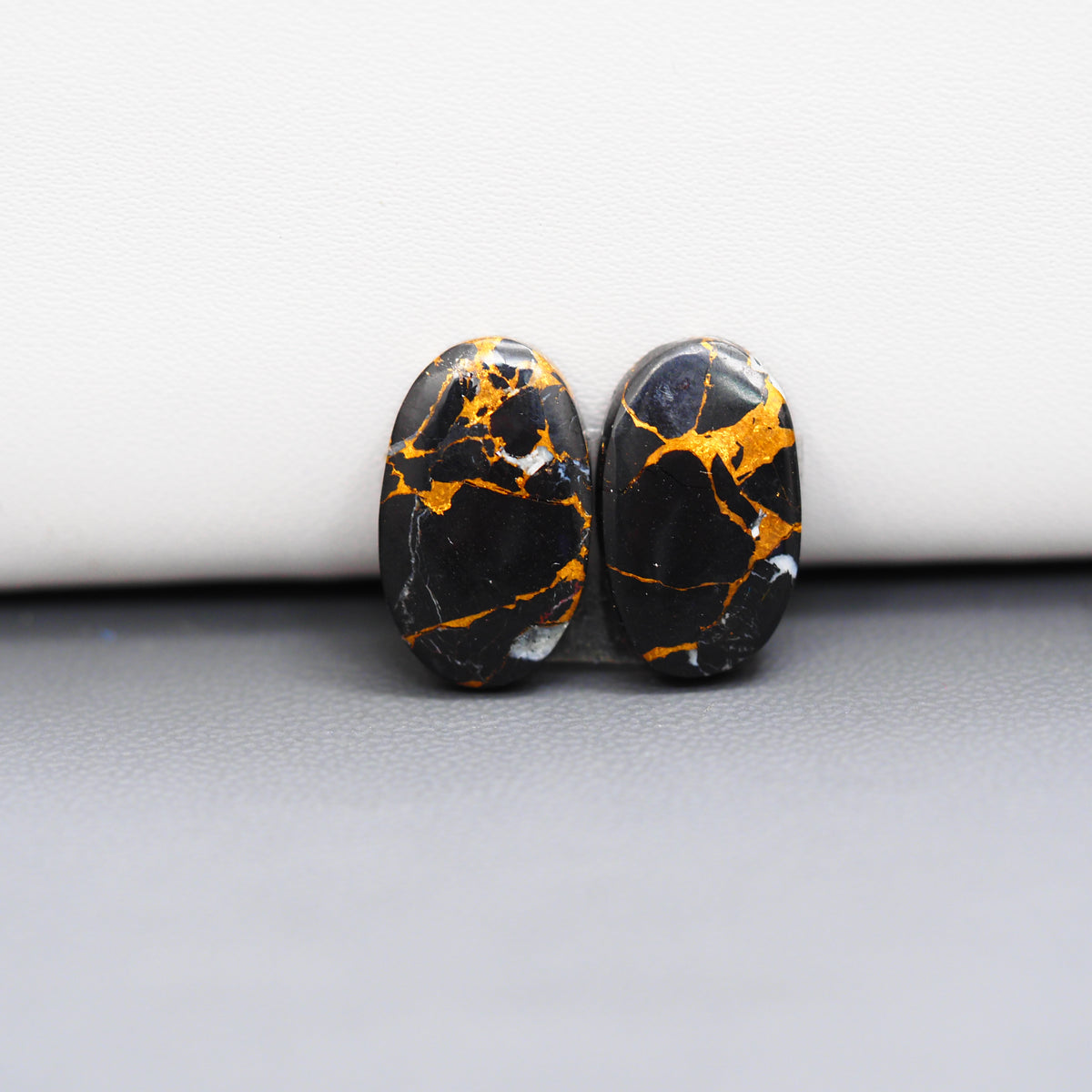 Kingman Black Buffalo Copper Composite Oval Cabochon Pair 17x10x3mm 11.5ct - black stone with bright copper veins - Pedra Gems