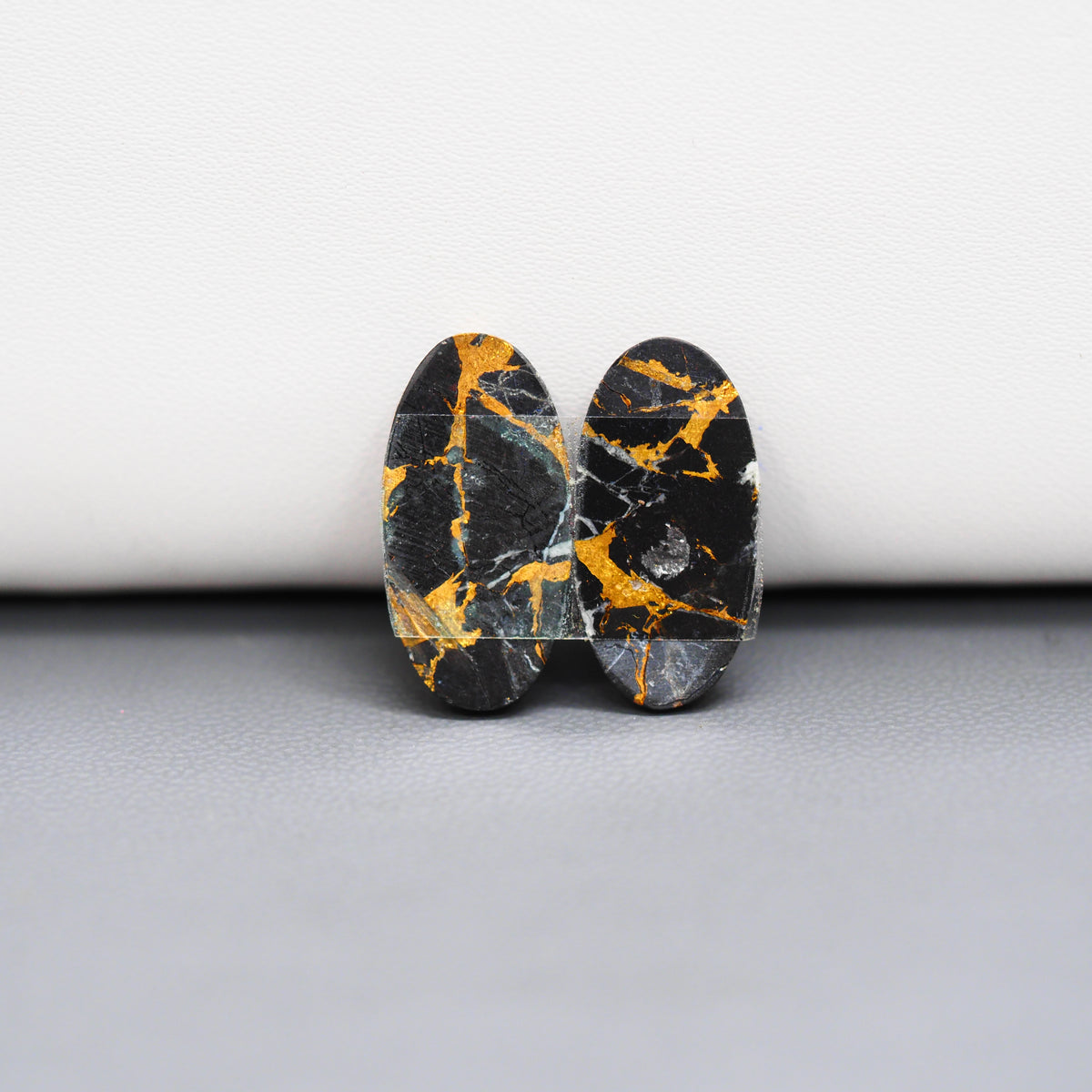 Kingman Black Buffalo Copper Composite Oval Cabochon Pair 20x10x3mm 14ct - black stone with bright copper veins - Pedra Gems