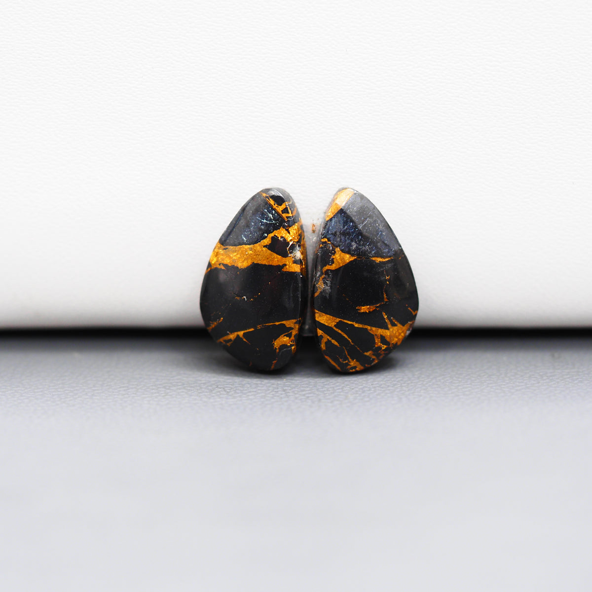 Kingman Black Buffalo Copper Composite Freeform Cabochon Pair 17x10x3mm 11ct - black stone with bright copper veins - Pedra Gems