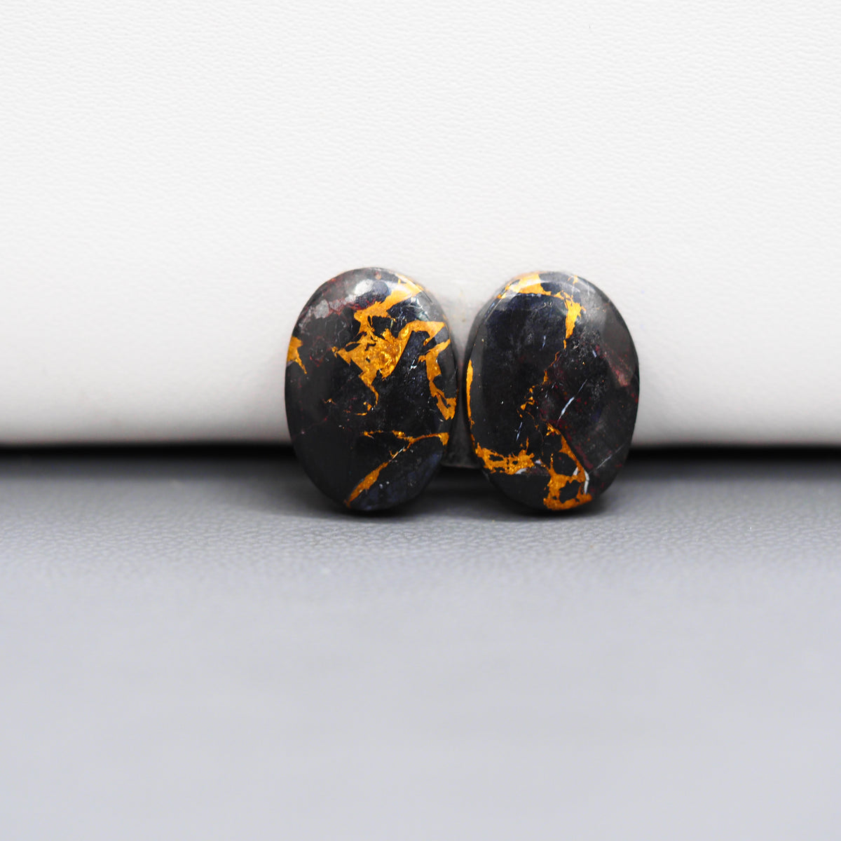 Kingman Black Buffalo Copper Composite Oval Cabochon Pair 15x11x3mm 10.5ct - black stone with bright copper veins - Pedra Gems