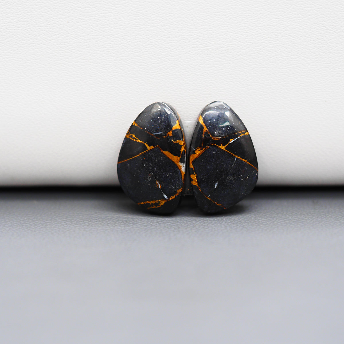 Kingman Black Buffalo Copper Composite Freeform Cabochon Pair 18x11x4mm 14ct - black stone with bright copper veins - Pedra Gems