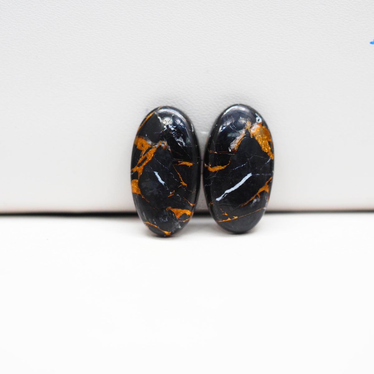 Kingman Black Buffalo Copper Composite Oval Cabochon Pair 20x11x4mm 15.5ct - black stone with bright copper veins - Pedra Gems