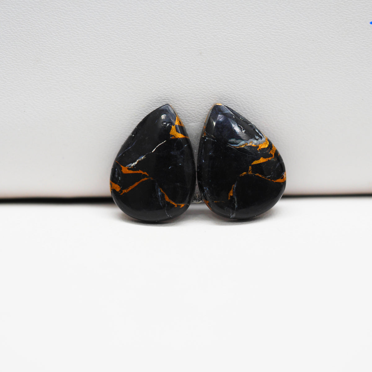 Kingman Black Buffalo Copper Composite Pear Cabochon Pair 18x11x3mm 12.5ct - black stone with bright copper veins - Pedra Gems