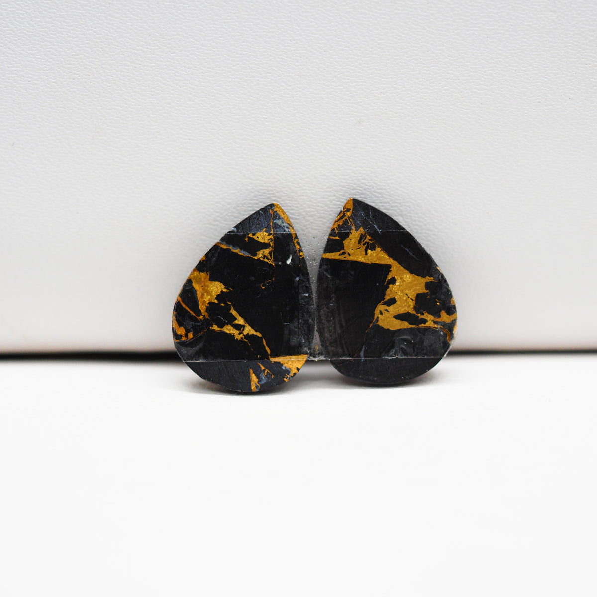 Kingman Black Buffalo Copper Composite Pear Cabochon Pair 18x11x3mm 12.5ct - black stone with bright copper veins - Pedra Gems