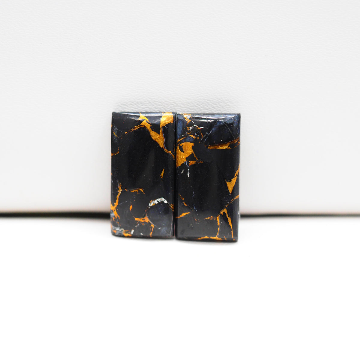 Kingman Black Buffalo Copper Composite Rectangle Cabochon Pair 19x10x3mm 13.5ct - black stone with bright copper veins - Pedra Gems