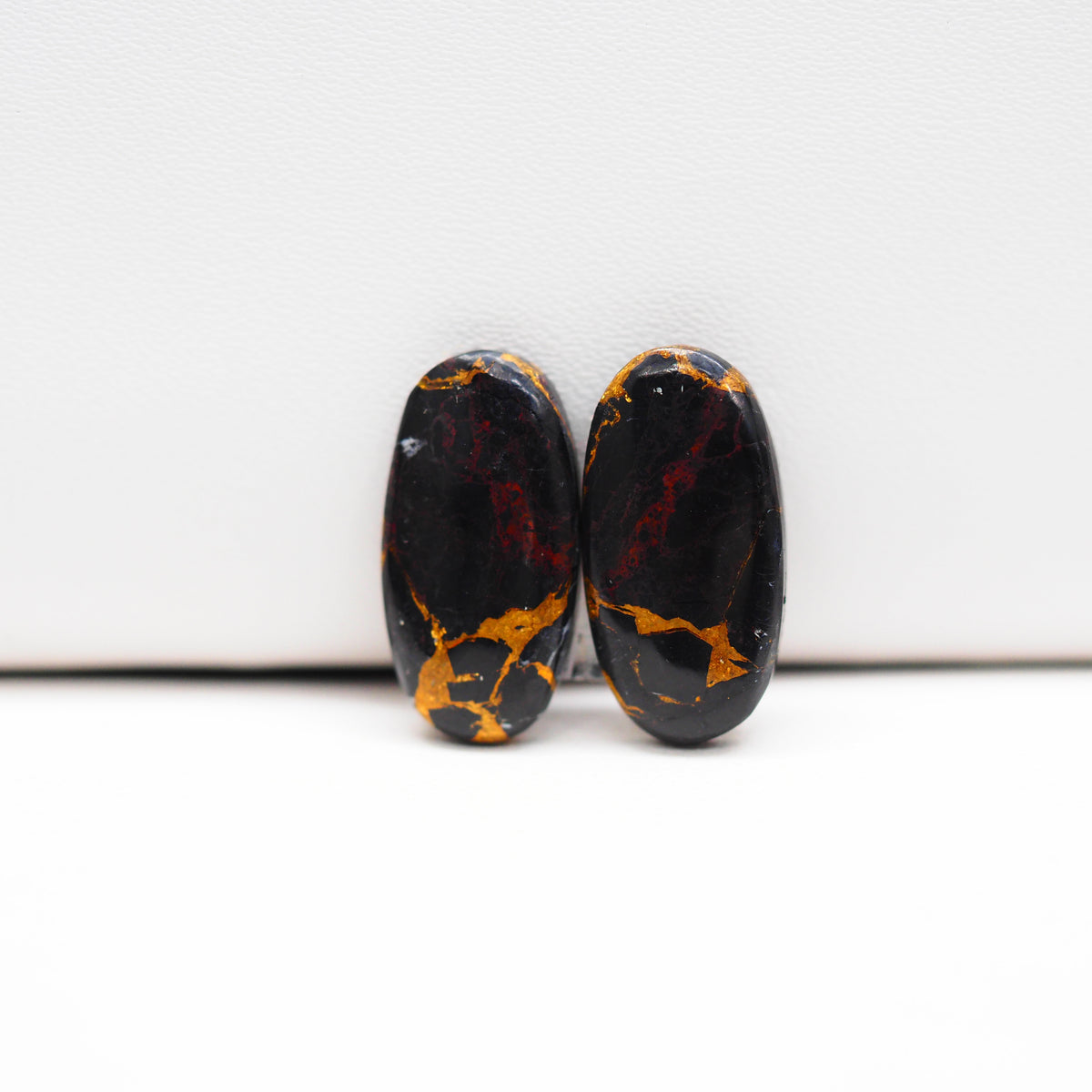 Kingman Black Buffalo Copper Composite Oval Cabochon Pair 18x9x3mm 10.5ct - black stone with bright copper veins - Pedra Gems