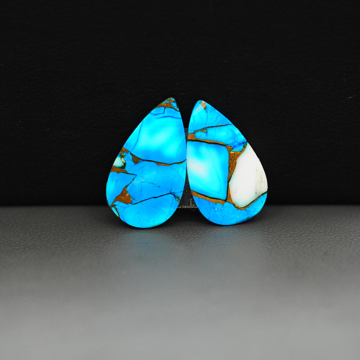 Kingman Ice Blue Dahlia Composite Pear Cabochon Pair 20x11x3mm 13ct - icy blue and white stone with copper veining - Pedra Gems