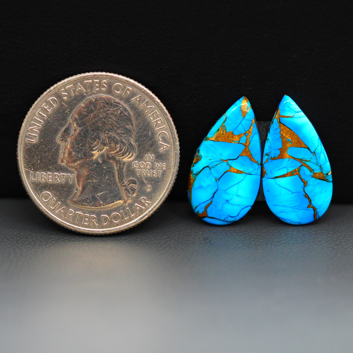 Kingman Ice Blue Dahlia Composite Pear Cabochon Pair 19x11x3mm 10ct - icy blue and white stone with copper veining - Pedra Gems