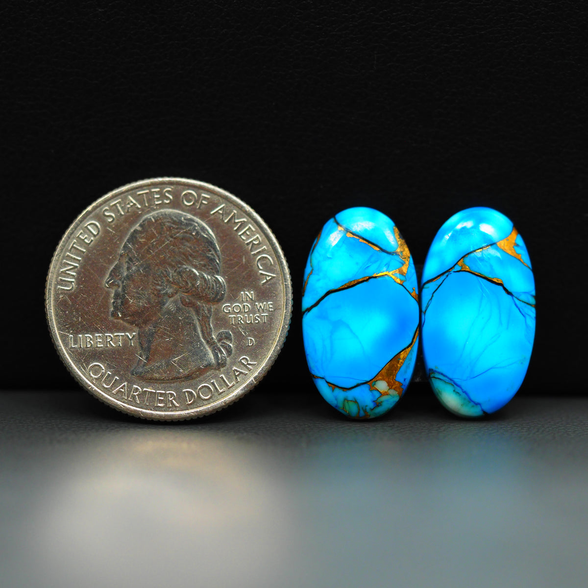 Kingman Ice Blue Dahlia Composite Oval Cabochon Pair 20x11x3mm 14ct - icy blue and white stone with copper veining - Pedra Gems