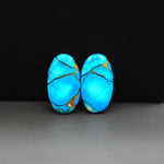 Kingman Ice Blue Dahlia Composite Oval Cabochon Pair 20x11x3mm 14ct - icy blue and white stone with copper veining - Pedra Gems