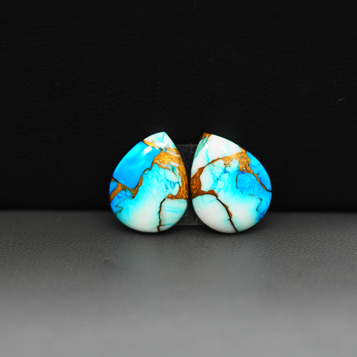 Kingman Ice Blue Dahlia Composite Pear Cabochon Pair 15x11x3mm 9.5ct - icy blue and white stone with copper veining - Pedra Gems