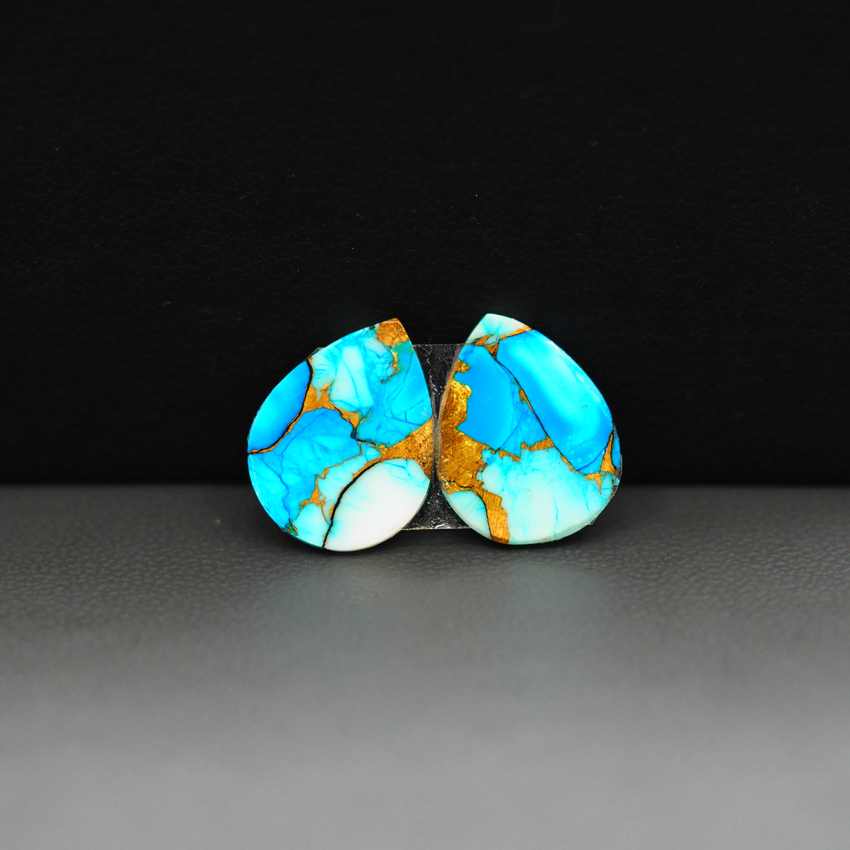 Kingman Ice Blue Dahlia Composite Pear Cabochon Pair 15x11x3mm 9.5ct - icy blue and white stone with copper veining - Pedra Gems