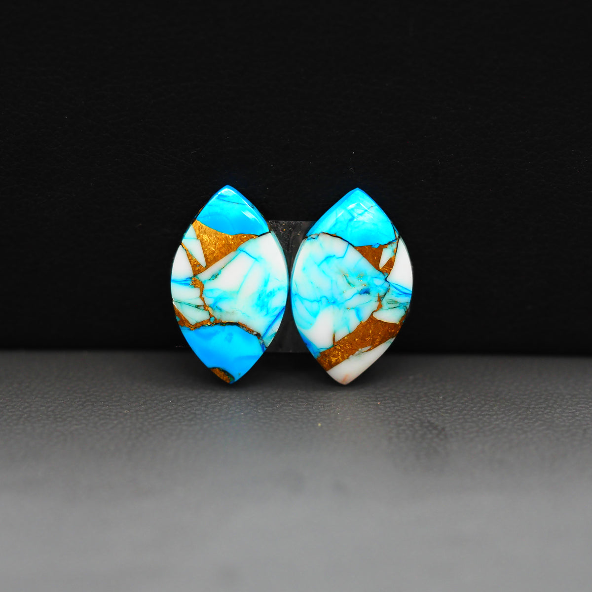 Kingman Ice Blue Dahlia Composite Marquise Cabochon Pair 18x11x3mm 12ct - icy blue and white stone with copper veining - Pedra Gems