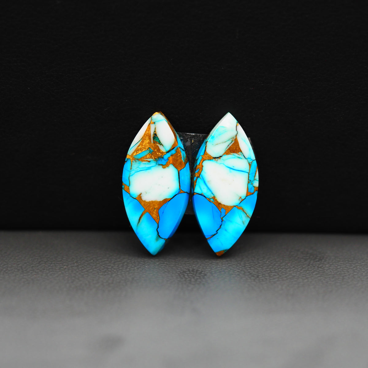 Kingman Ice Blue Dahlia Composite Marquise Cabochon Pair 20x10x3mm 12ct - icy blue and white stone with copper veining - Pedra Gems