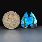 Kingman Ice Blue Dahlia Composite Pear Cabochon Pair 21x11x3mm 14ct - icy blue and white stone with copper veining - Pedra Gems