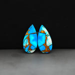 Kingman Ice Blue Dahlia Composite Pear Cabochon Pair 21x11x3mm 14ct - icy blue and white stone with copper veining - Pedra Gems