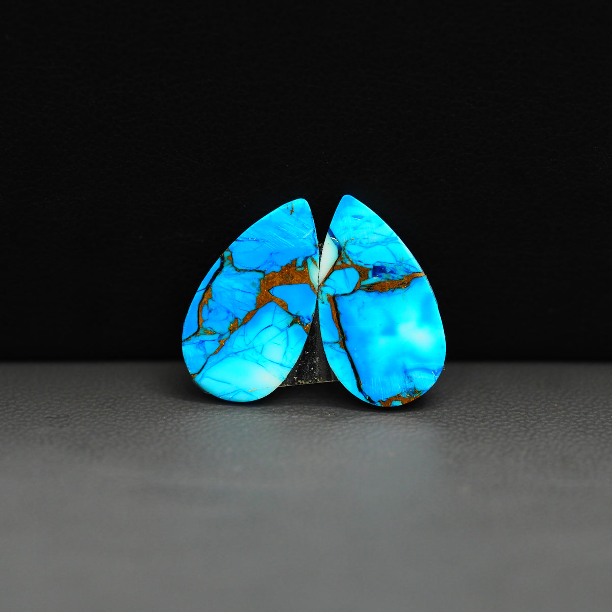 Kingman Ice Blue Dahlia Composite Pear Cabochon Pair 19x11x3mm 12ct - icy blue and white stone with copper veining - Pedra Gems
