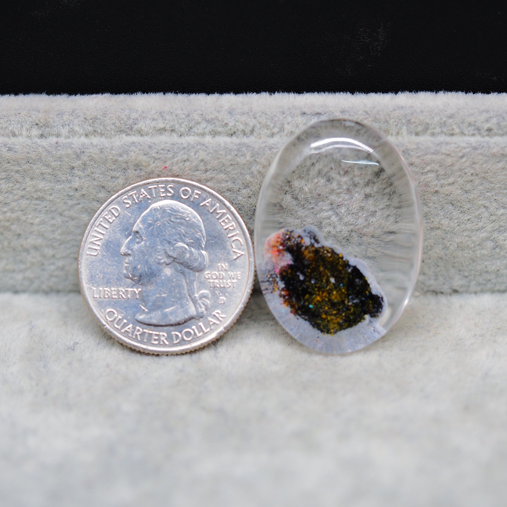 Garden quartz drill and fill cabochon 31x23mm front view US quarter dollar size reference Pedra Gems