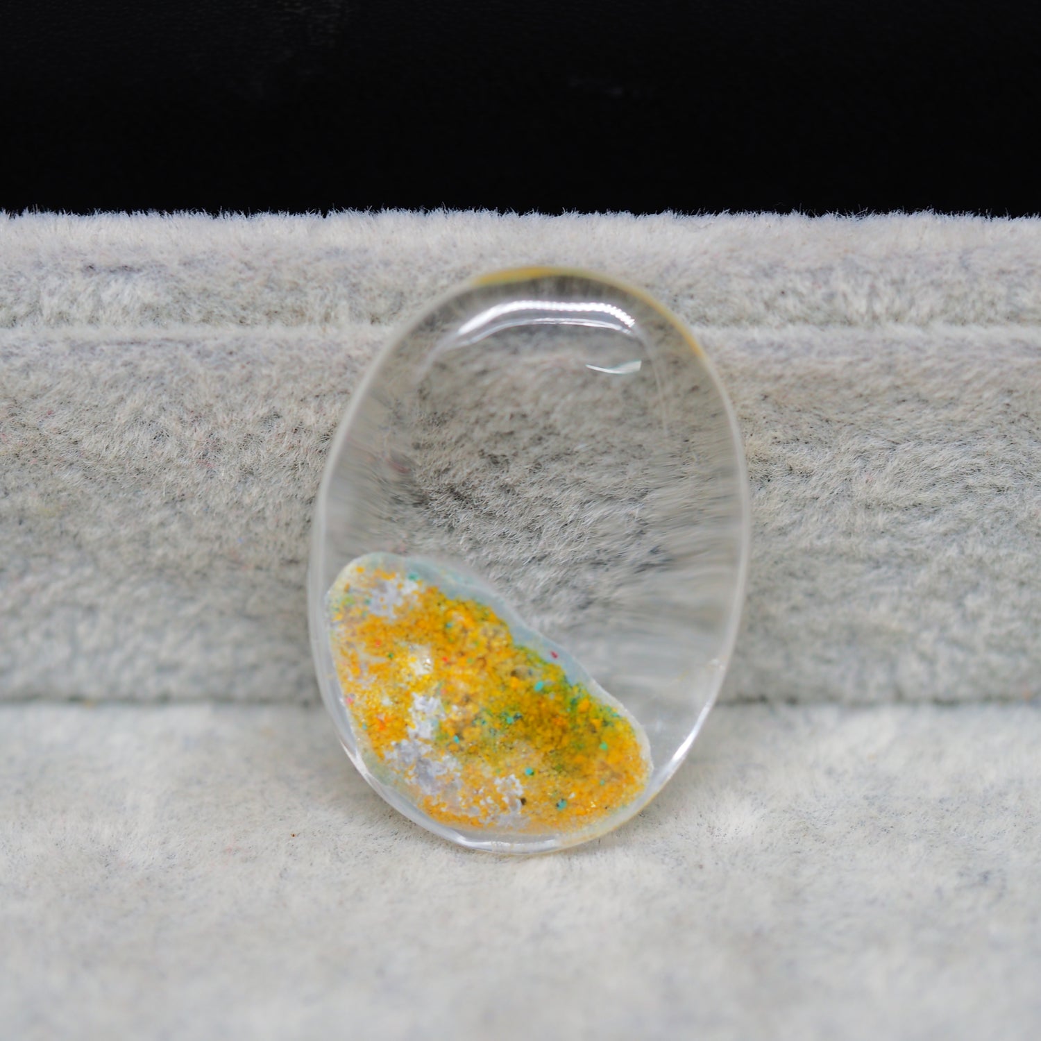 Garden quartz drill fill cabochon 32x23mm oval top view coin size comparison