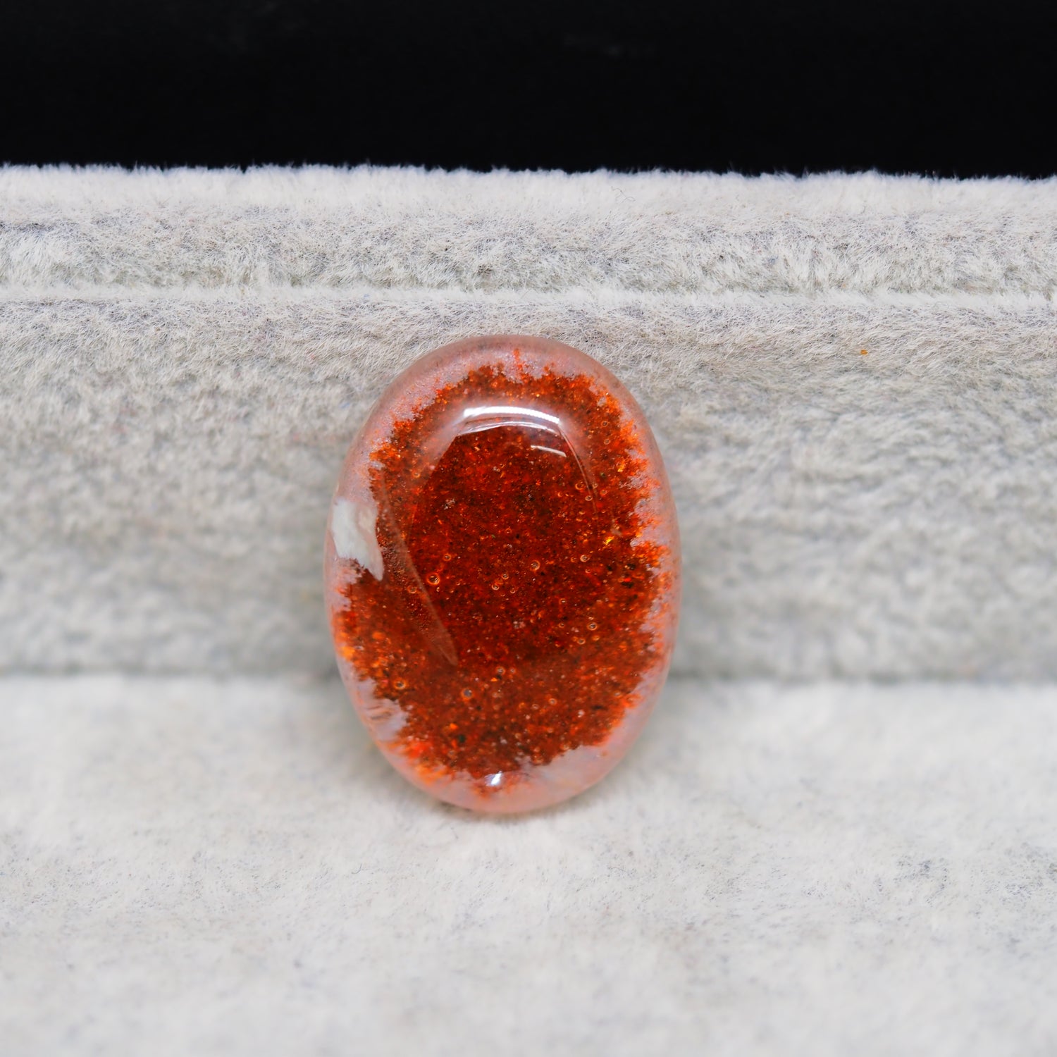 Garden quartz drill fill cabochon 25x18mm oval top view coin size comparison