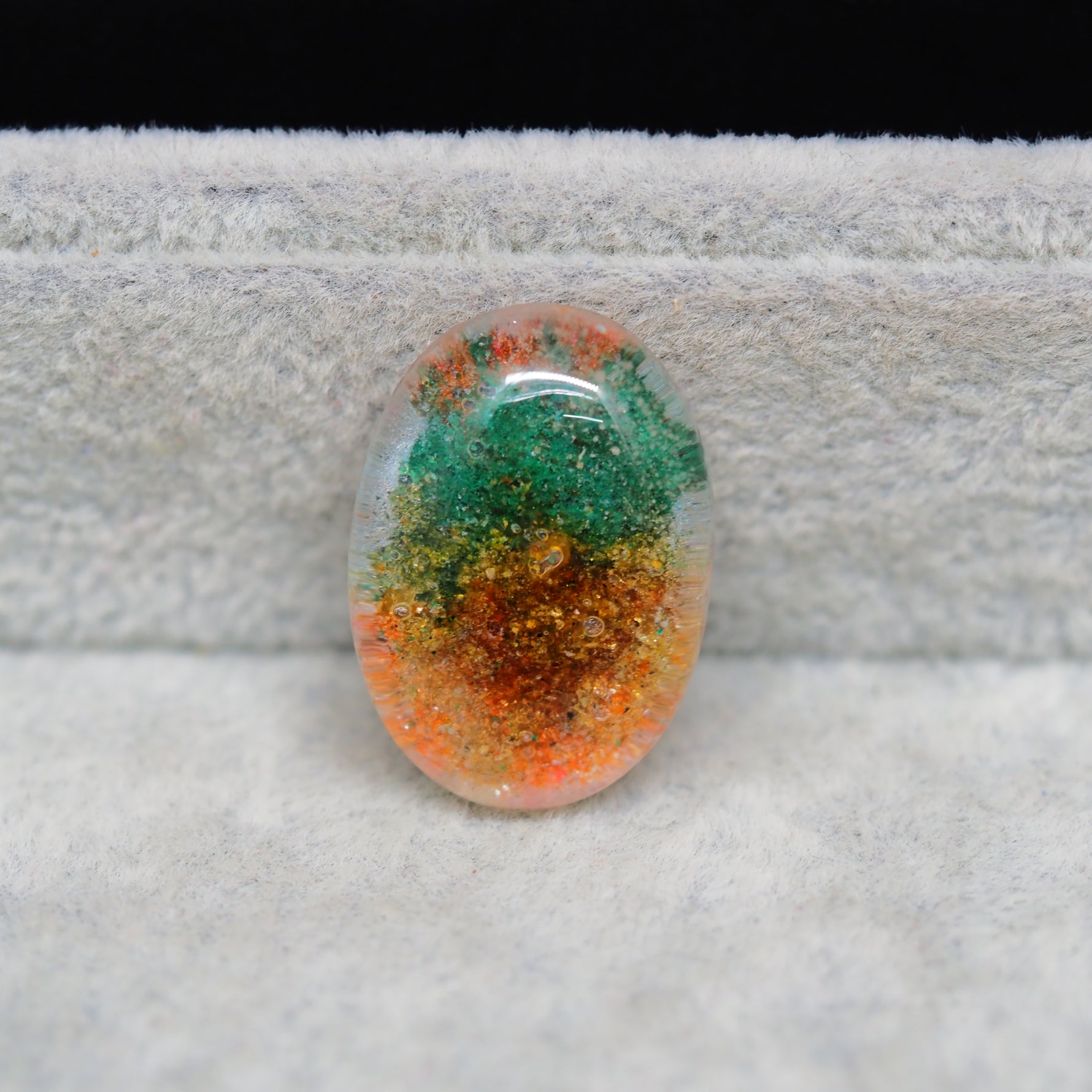 Garden quartz drill fill cabochon 26x18mm oval top view coin size comparison
