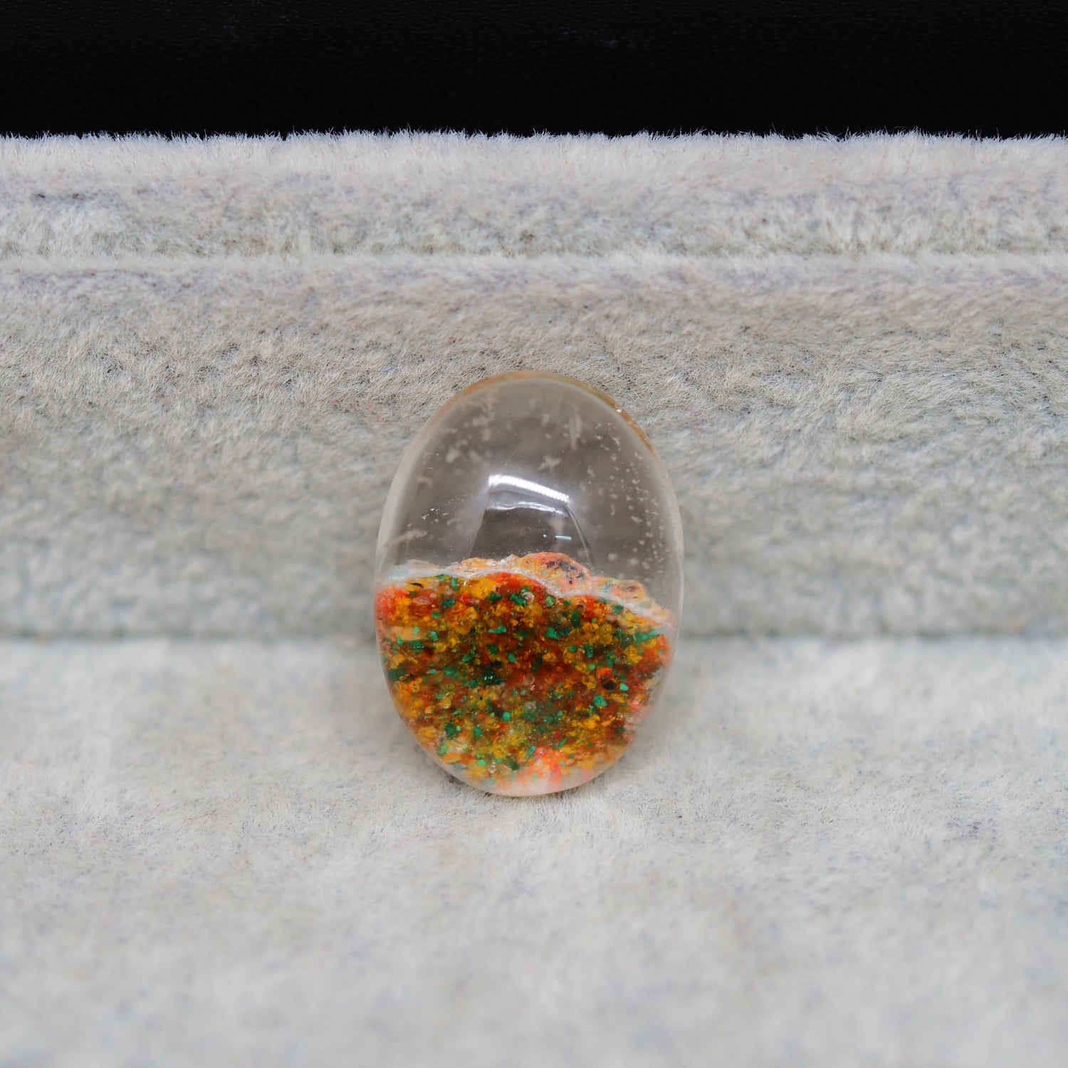 Garden quartz drill fill cabochon 22x16mm oval top view coin size comparison